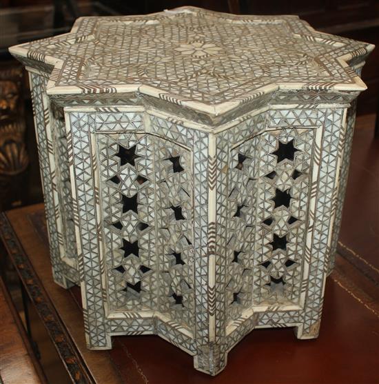 An Islamic mother of pearl and bone inlaid low occasional table, W.1ft 6.5in.